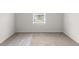 Bedroom featuring carpeted floor, window and neutral paint at 2955 Jefferson St, Austell, GA 30106