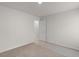 Bedroom featuring carpeted floor, a door and neutral paint at 2955 Jefferson St, Austell, GA 30106