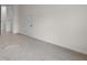 Bedroom featuring carpeted floor, door and neutral paint at 2955 Jefferson St, Austell, GA 30106