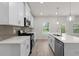 Bright kitchen featuring stainless steel appliances and a view of the yard at 2955 Jefferson St, Austell, GA 30106