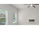 Bright living room with large windows, decorative fireplace and ceiling fan at 2955 Jefferson St, Austell, GA 30106