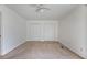 Bright bedroom features carpet, two closets, neutral paint and a ceiling fan providing comfort and storage at 6 Nw Fairway Nw Dr, Kennesaw, GA 30144