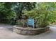 Attractive sign for Pinetree Country Club Condominiums with beautiful landscaping at 6 Nw Fairway Nw Dr, Kennesaw, GA 30144