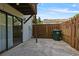 Private outdoor patio space with wood fence offers a relaxing retreat at 6 Nw Fairway Nw Dr, Kennesaw, GA 30144