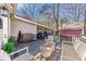 Stylish deck featuring comfortable seating, ambient lighting, and lush greenery, perfect for entertaining and relaxation at 1069 Colquitt Ne Ave, Atlanta, GA 30307
