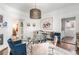 Bright dining room with a glass table and modern decor, seamlessly connecting to other living spaces at 1069 Colquitt Ne Ave, Atlanta, GA 30307