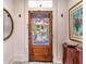 Inviting entryway with a glass-paneled door that offers a view of the beautiful home exterior at 1069 Colquitt Ne Ave, Atlanta, GA 30307