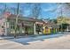 Street view of commercial buildings featuring brick and colorful facades, awnings, and storefronts at 1069 Colquitt Ne Ave, Atlanta, GA 30307