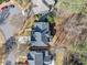 An aerial view of the home's roof and landscaping with surrounding homes and neighborhood at 345 Crown Vetch Ln, Alpharetta, GA 30005