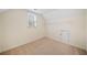 Bedroom with neutral walls, carpet, window, and closet space at 345 Crown Vetch Ln, Alpharetta, GA 30005