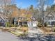 Beautiful two-story home with a well-manicured lawn and attached two-car garage at 345 Crown Vetch Ln, Alpharetta, GA 30005
