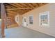 Outdoor patio area with a door, natural light, and access to backyard landscaping at 345 Crown Vetch Ln, Alpharetta, GA 30005