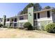 Well-maintained apartment building with manicured landscaping offers a serene and comfortable living environment at 1325 Branch Dr, Tucker, GA 30084