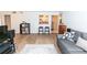 Spacious living room with an open kitchen view, complete with bar stools and modern decor at 1325 Branch Dr, Tucker, GA 30084