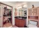 Bathroom featuring a vanity with ample storage and a separate closet for the washer and dryer at 390 17Th Nw St # 4031, Atlanta, GA 30363