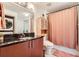 Bathroom featuring a vanity with ample storage and a separate closet for the washer and dryer at 390 17Th Nw St # 4031, Atlanta, GA 30363