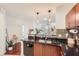 Stylish kitchen featuring granite countertops, modern appliances, and convenient access to dining area at 390 17Th Nw St # 4031, Atlanta, GA 30363