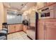 Modern kitchen featuring stainless steel appliances, track lighting, and ample cabinet space with a black countertop at 390 17Th Nw St # 4031, Atlanta, GA 30363