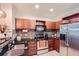 Well-equipped kitchen with stainless steel appliances, tile backsplash, and granite countertops at 390 17Th Nw St # 4031, Atlanta, GA 30363