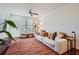 Comfortable living room with a neutral color palette, ceiling fan, and decorative plants at 390 17Th Nw St # 4031, Atlanta, GA 30363