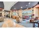 Bright and open lobby area with comfortable seating, stylish decor, and hardwood flooring at 390 17Th Nw St # 4031, Atlanta, GA 30363