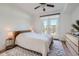 Calm main bedroom with private balcony, natural light, and serene decor at 390 17Th Nw St # 4031, Atlanta, GA 30363