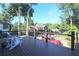 Enjoy outdoor living on this spacious deck with modern railings and comfortable seating overlooking the driveway at 584 Cherokee Ne St, Marietta, GA 30060