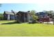 Fenced backyard with covered patio and grassy area at 584 Cherokee Ne St, Marietta, GA 30060