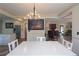 Bright dining area with chandelier, table and chairs, and connecting rooms at 584 Cherokee Ne St, Marietta, GA 30060