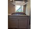 Kitchen featuring stainless steel appliances, granite countertops, and a brick backsplash at 584 Cherokee Ne St, Marietta, GA 30060