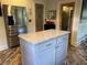 Modern kitchen island with granite countertops and stainless steel appliances at 584 Cherokee Ne St, Marietta, GA 30060