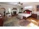Spacious main bedroom featuring a fireplace, hardwood floors and lots of natural light at 584 Cherokee Ne St, Marietta, GA 30060