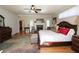 Elegant main bedroom with hardwood floors, fireplace, and natural light from many windows at 584 Cherokee Ne St, Marietta, GA 30060