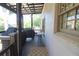 Outdoor porch features covered grills and easy access to the sunroom at 584 Cherokee Ne St, Marietta, GA 30060