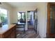 View of a covered porch with outdoor furniture and brick exterior at 584 Cherokee Ne St, Marietta, GA 30060