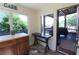 Sunroom featuring access to a covered porch and outdoor deck at 584 Cherokee Ne St, Marietta, GA 30060