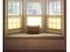 Comfortable window seat in a bay window, perfect for relaxing and reading at 584 Cherokee Ne St, Marietta, GA 30060
