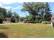Front yard view of property with mature trees at 584 Cherokee Ne St, Marietta, GA 30060