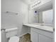 Bathroom featuring a neutral color palette, large vanity, and well-lit mirror at 68 Silverthorne Pass, Douglasville, GA 30134