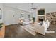 Bright living room featuring a stone fireplace, vaulted ceiling, and neutral decor at 68 Silverthorne Pass, Douglasville, GA 30134