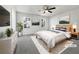 Cozy main bedroom with plush carpet, natural light, and contemporary decor at 68 Silverthorne Pass, Douglasville, GA 30134
