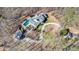 Aerial view of a secluded property featuring a pool, detached garage and circular driveway at 5430 Burdette Se Rd, Mableton, GA 30126