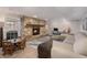 Finished basement featuring a stone fireplace, a cozy seating area, and built-in shelves at 5430 Burdette Se Rd, Mableton, GA 30126