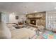 Cozy finished basement with a stone fireplace, a sectional sofa, and lots of space for entertainment at 5430 Burdette Se Rd, Mableton, GA 30126