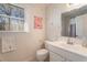 Cozy bathroom with neutral tones, vanity and shower at 5430 Burdette Se Rd, Mableton, GA 30126