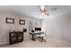 Bright bedroom featuring a ceiling fan, neutral walls and carpet, with a window bringing in natural light at 5430 Burdette Se Rd, Mableton, GA 30126