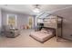 Bedroom featuring a unique bunk bed with an adjacent sitting area at 5430 Burdette Se Rd, Mableton, GA 30126