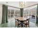 Breakfast nook with wooden table, green accents, and sliding glass doors to the deck at 5430 Burdette Se Rd, Mableton, GA 30126