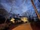 Charming exterior view of a well-maintained home nestled among trees, perfect for serene living at 5430 Burdette Se Rd, Mableton, GA 30126