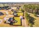 Wide aerial view of property, featuring a fenced backyard with pool and outbuilding at 363 Safe Harbor Dr, Dallas, GA 30157
